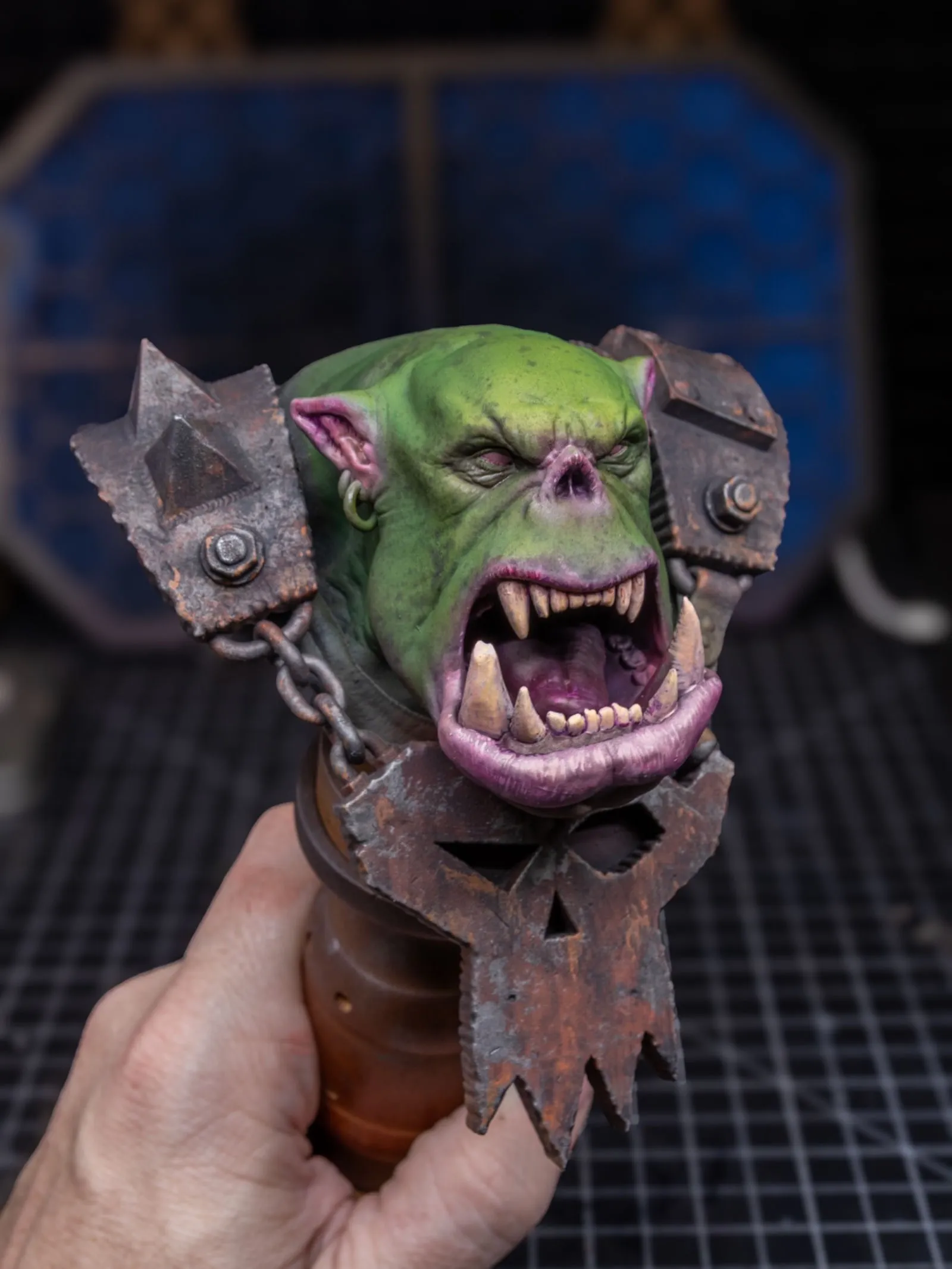 Ork bust with color applied, bright acidic green skin with purple in the shadows